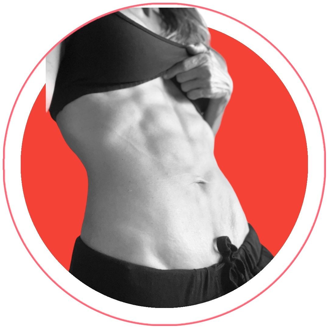 Close-up of a person lifting their top to reveal toned abdominal muscles against a red circular background.