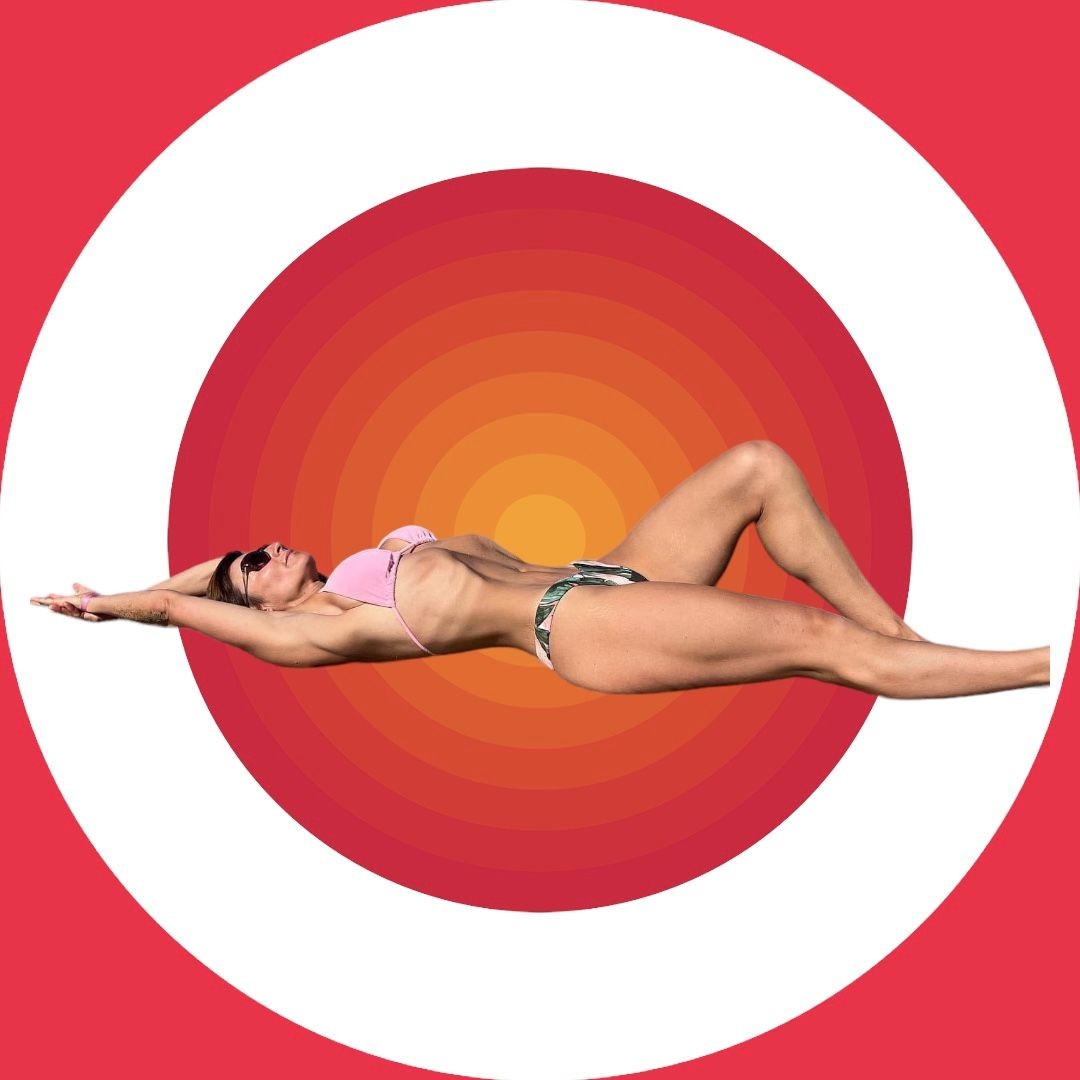 Person in a pink bikini posing against a red and orange concentric circles background.